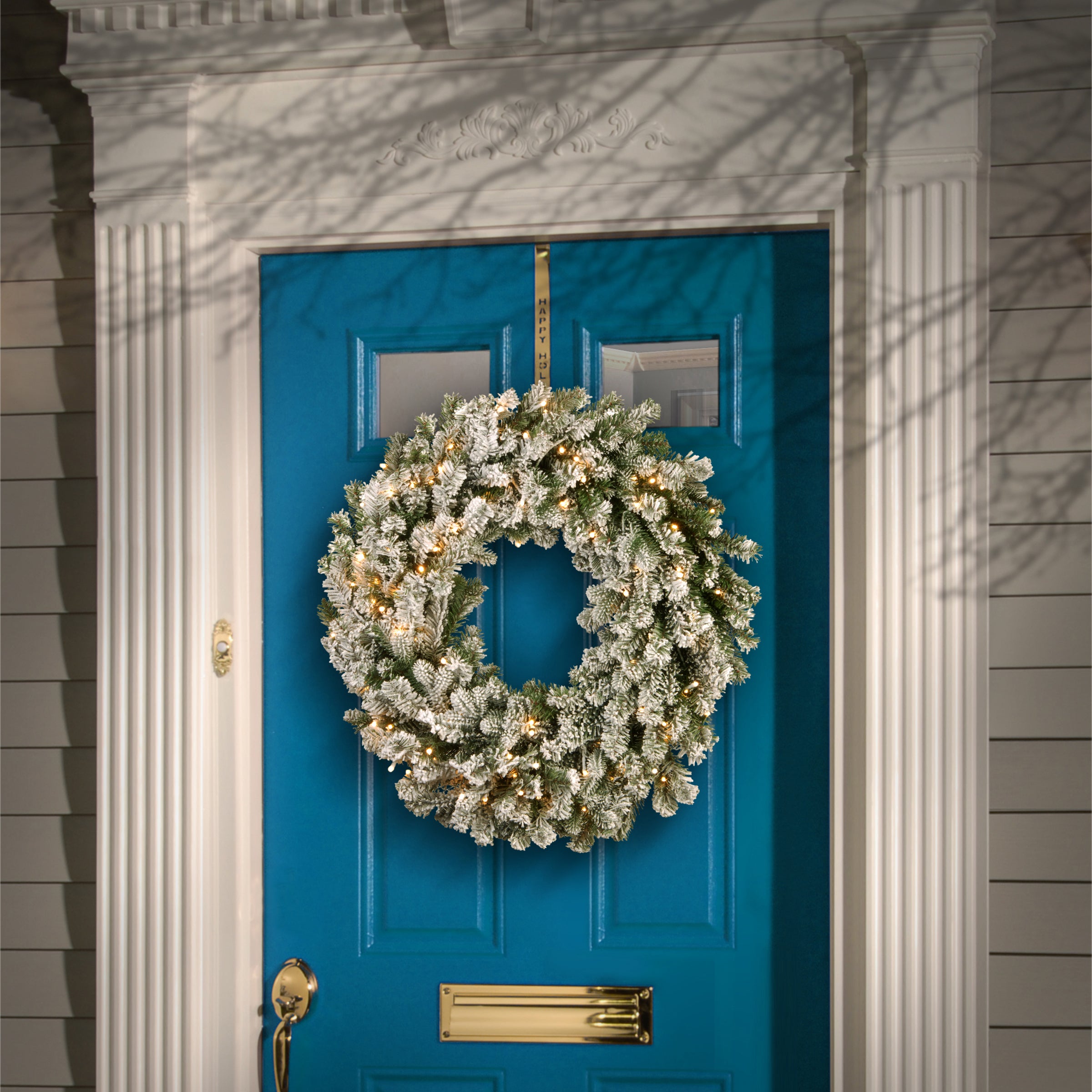 24 in. Pre-Lit Snowy Sheffield Spruce Wreath with Warm White LED Lights